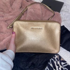 Gold Michael Kors crossbody purse